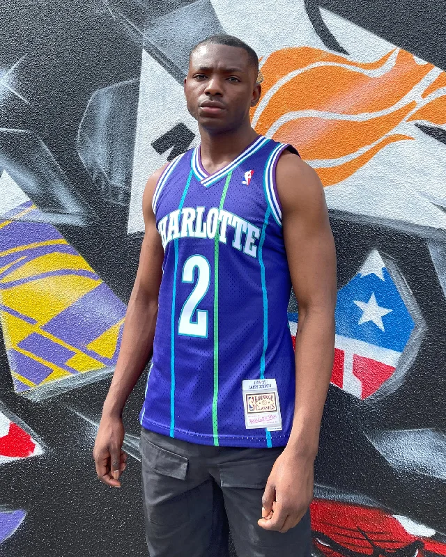 Mitchell & Ness Charlotte Hornets Larry Johnson #2 '94-'95 Swingman Jersey Purple Sophisticated Jersey Tee Mitchell & Ness Charlotte Hornets Larry Johnson #2 '94-'95 Swingman Jersey Purple Sophisticated Jersey Tee
